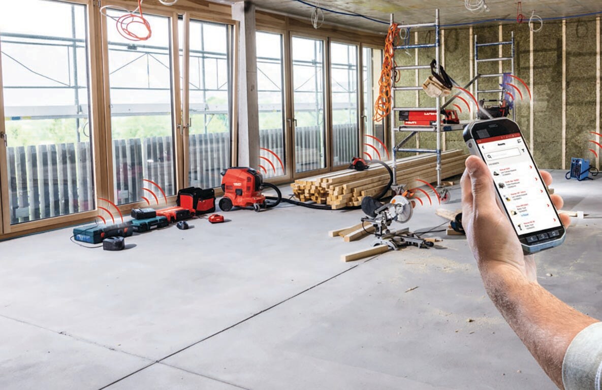 a man uses ON!Track on a mobile device to scan a hilti tool box